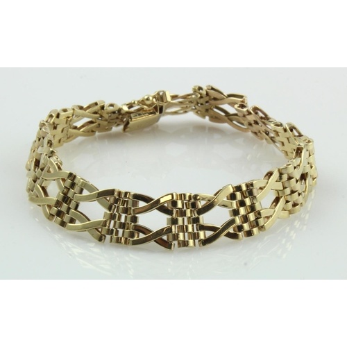 9ct yellow gold crossover and panther linked bracelet, width...