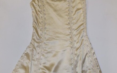A 1920's beaded & diamonte flapper dress in cream...