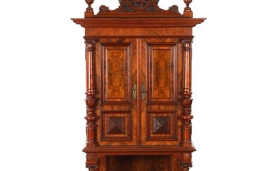 A 19TH CENTURY BURR WALNUT SIDE CABINET with carved pediment...