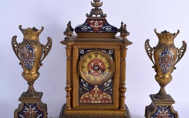 A 19TH CENTURY FRENCH BRONZE AND CHAMPLEVÉ ENAMEL CLOCK