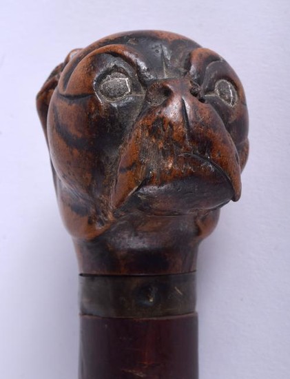A 19TH CENTURY TREEN PUG DOG HEAD PAGE TURNER probably