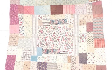 A 19th Century Printed Cotton Patchwork Bed Cover, with central...