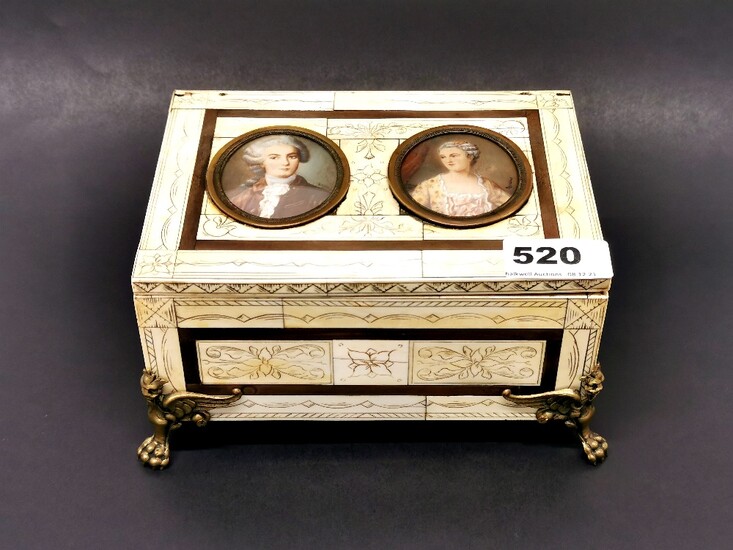 A century continental ivory covered music box inset with two handpainted portrait miniatures, 19 x 14 x 10cm.