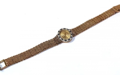 A 9 carat Bueche Girod wristwatch, diamond and sapphire bezel...