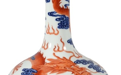 A BLUE AND WHITE IRON-RED DRAGON LONG-NECKED VASE