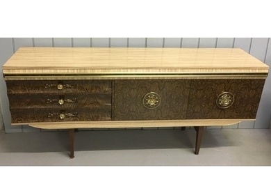 A Beautility-style, mid-century sideboard. Three drawers & s...