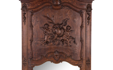 A Belgian Louis XV Style Carved Oak Trumeau Mirror