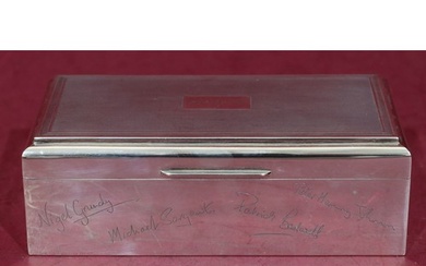 A Birmingham Mappin & Webb silver cigarette box with engine ...