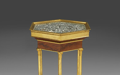 A CONSULAT ORMOLU-MOUNTED MAHOGANY AND GRANIT OBICULAIRE GUERIDON ATTRIBUTED TO JACOB FRERES, CIRCA 1800