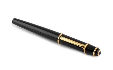 A Cartier ball point pen, in black with blue resin...
