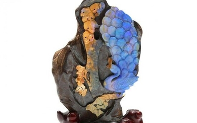 A Chinese Boulder Opal Peacock Carving