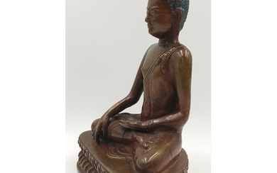 A Chinese Bronze Seated Buddha Figure. 20cm tall. 16cm width...