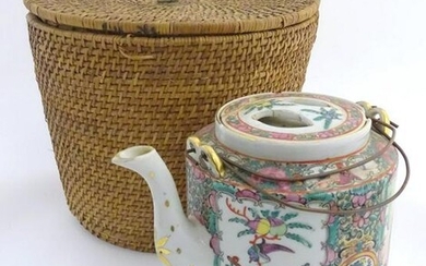 A Chinese Cantonese teapot and cover with famille rose