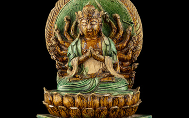 A Chinese Sancai Glazed Stoneware Figure of Seated Guanyin