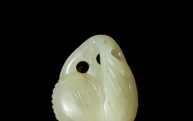 A Chinese carved jade 'fruit' pendant, 19th century