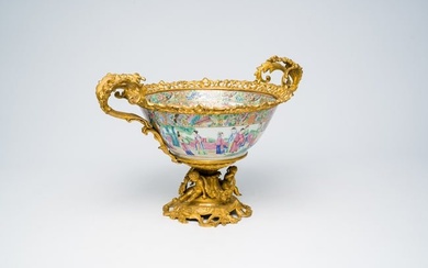 A Chinese gilt bronze mounted Canton famille rose bowl with a palace scene all around. 19th C.