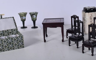 A Chinese miniature hardwood table and chairs with mother of pearl inlay together with a pair of sma