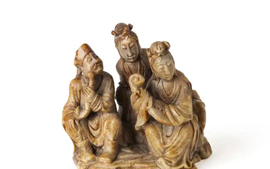 A Chinese soapstone 'musicians' group Late Qing dynasty Carved as two lady...