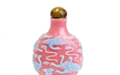 A Chinese turquoise-blue overlay pink glass 'cranes' snuff bottle 20th century Finely...