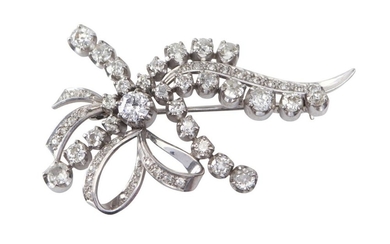 A DIAMOND BROOCH - Of bow design, set with old European cut diamonds totalling 4.10cts, in 18ct white gold.