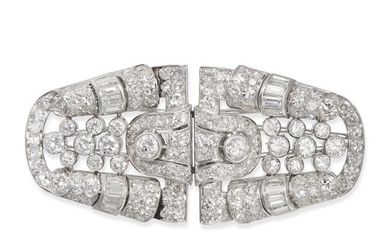 A DIAMOND DOUBLE CLIP BROOCH in white gold and platinum, the openwork brooch set throughout with