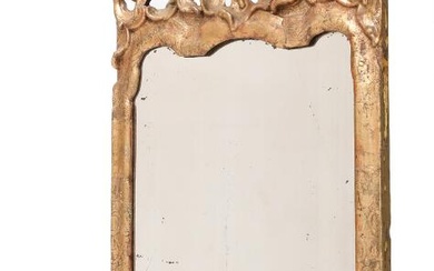 A Danish Rococo giltwood mirror, with ar pair of brass bracket candle...