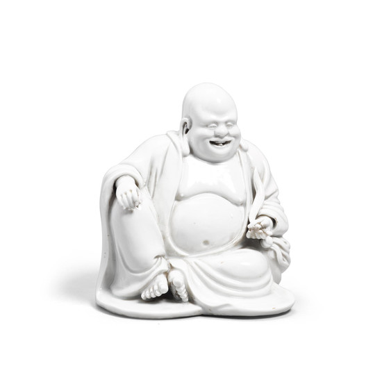 A Dehua porcelain figure of Budai