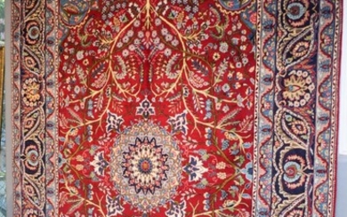 A FINELY HAND-KNOTTED & RARE PERSIAN YAZD CARPET. 100% WOOL PILE. CITY WEAVE WITH RARE DESIGN OF SUNBURST FLORAL MEDALLION & QUARTER...