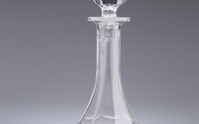 A GLASS DECANTER AND STOPPER, the stopper faceted, the