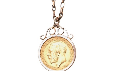 A GOLD HALF SOVEREIGN. 1913, in a 9ct gold pendant mount, on...