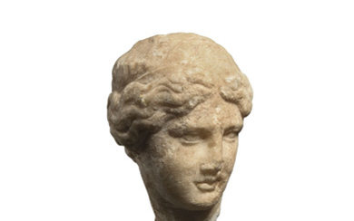 A GREEK MARBLE HEAD OF A GODDESS, CLASSICAL PERIOD, CIRCA 4TH CENTURY B.C.