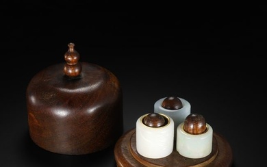 A GROUP OF QING DYNASTY HOTAN WHITE JADE COVERED WITH GOLD AND JADE COVERED WITH GOLD AND JADE RINGS