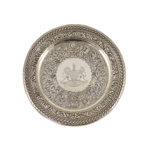 A George IV Irish embossed silver charger, by Stephen Bergin...