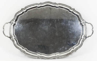 A George V Plain Silver Oval Two-Handled Tray, by...