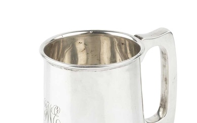 A George V silver pint tankard, of plain design with...