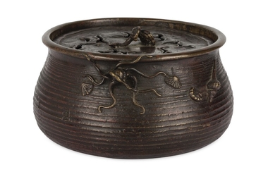 A JAPANESE BRONZE CENSER WITH A COVER.