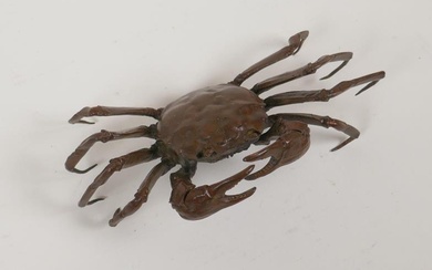 A Japanese bronze okimono of a crab, impressed seal...