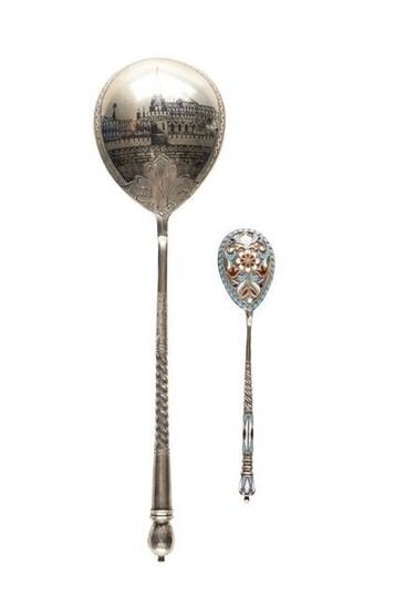 A LARGE SILVER AND NIELLO SPOON SHOWING AN