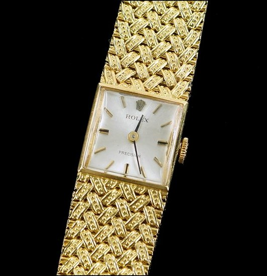 A Lady's 18 Karat Yellow Gold Rolex Watch.