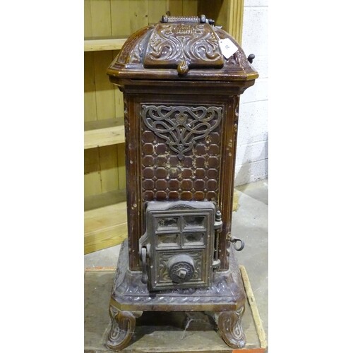 A Martin, an Art Nouveau cast iron wood-burning stove, paint...