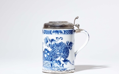 A Meissen porcelain tankard with floral decor