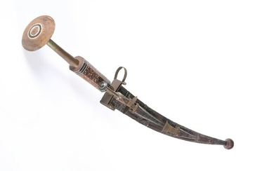 A NORTH AFRICAN TUAREG TAKOUBA SWORD WITH DAGGERS, the