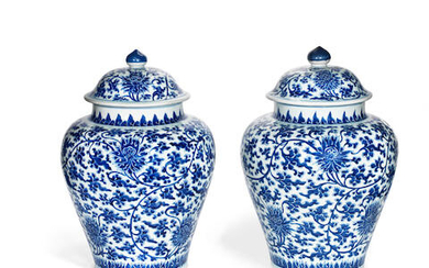 A PAIR OF BLUE AND WHITE BALUSTER JARS AND COVERS