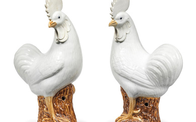 A PAIR OF LARGE WHITE-GLAZED STANDING COCKERELS 19th/20th century