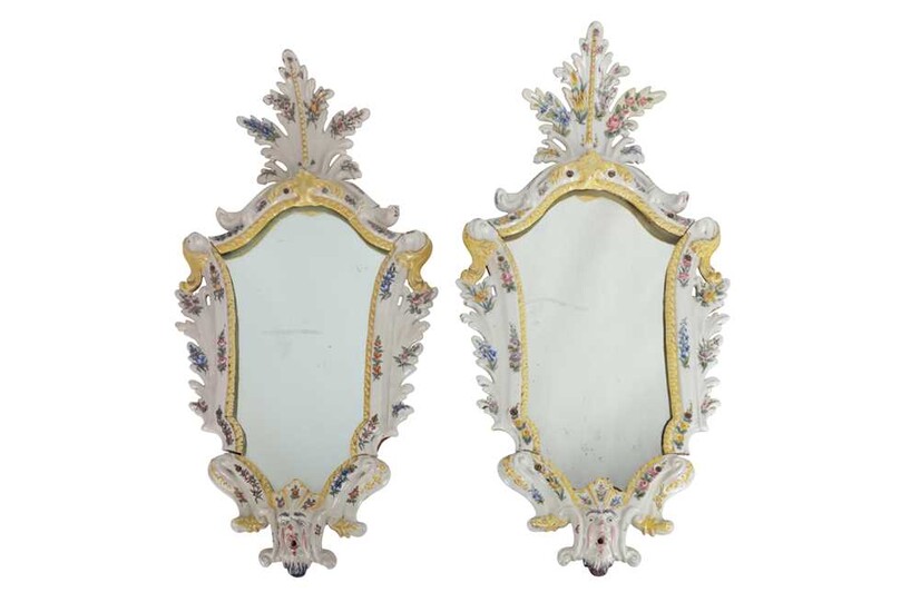 A PAIR OF NORTH ITALIAN POLYCHROME DECORATED MAJOLICA MIRROR FRAMES, 18TH CENTURY