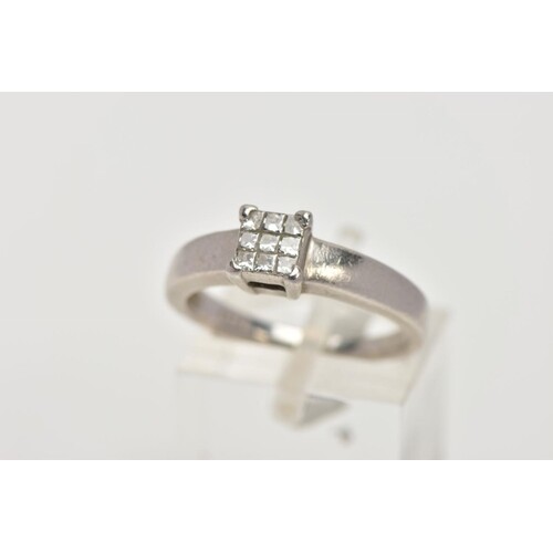 A PLATINUM DIAMOND RING, designed with a square cluster of n...