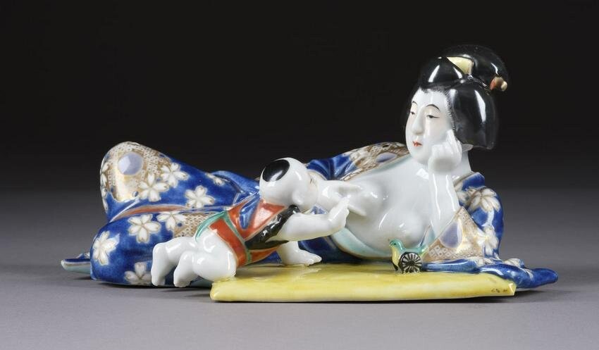 A PORCELAIN 'MOTHER AND CHILD'