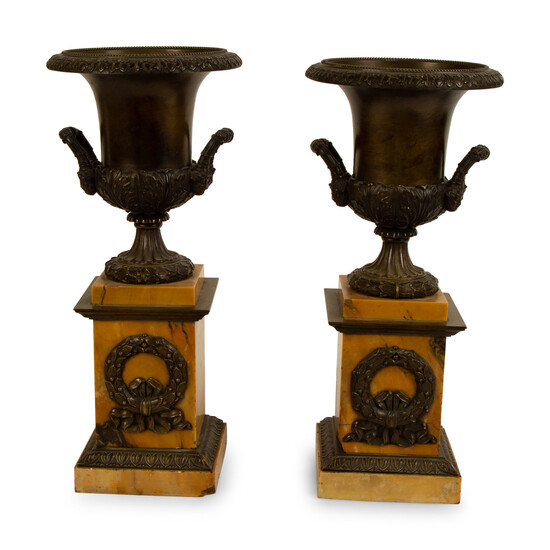 A Pair of French Bronze Urns on Marble Bases