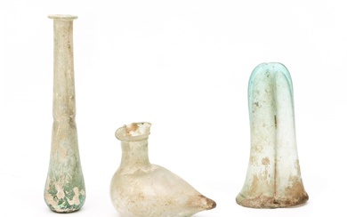 A Roman glass double balsamarium, a bird sprinkler and a long flask, 3r Century BC