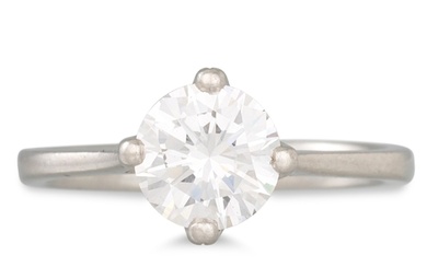 A SOLITAIRE DIAMOND RING, the brilliant cut diamond mounted ...